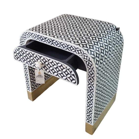 Black and white bone inlay waterfall nightstand with geometric leaf pattern and brass base Bone Inlay Bedside Table | Black Nightstand