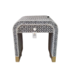 Black and white bone inlay waterfall nightstand with geometric leaf pattern and brass base Bone Inlay Bedside Table | Black Nightstand