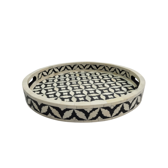 Round black and white bone inlay serving trays in geometric pattern