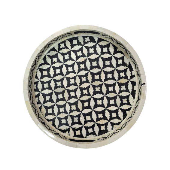 Round black and white bone inlay serving trays in geometric pattern