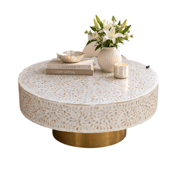 Round mother of pearl coffee table with white floral inlay pattern and brass base