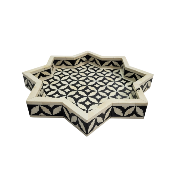 bone-inlay-black-white-star-trays-set-of-2 Set of two black and white star-shaped bone inlay trays in geometric pattern