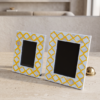 Set of two yellow mother of pearl inlay photo frames with trellis pattern