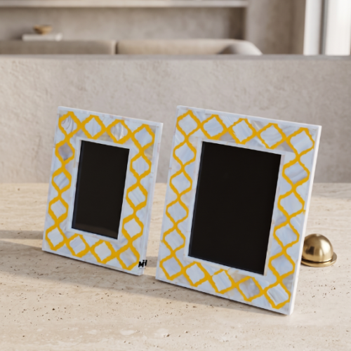 Set of two yellow mother of pearl inlay photo frames with trellis pattern